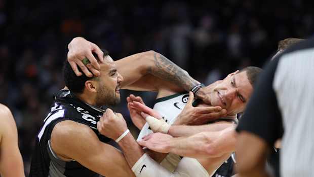 Sacramento Kings center Trey Lyles (41) confronts Milwaukee Bucks center Brook Lopez (11) during the fourth quarter at Golden 1 Center.